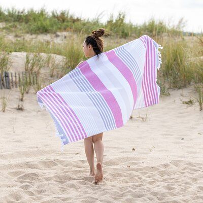 Enjoy some fun in the sun with the Lulu Stripe Beach Towel. Crafted from Cotton, this lightweight towel is fast-drying to help get you dry quickly after a dip in the ocean, pool, or hot tub. This oversized towel features a woven texture that is soft to the touch on one side and a highly absorbent terry cotton construction on the other side. Enjoy instant relaxation when you lounge atop the varying stripe design which is featured in an array of bright, seasonable colour options with tassel detail Ocean Pool, Fouta Towels, Pink Beach Towel, Sand Cloud, Striped Beach Towel, Cotton Beach Towel, Woven Texture, Cotton Bath Towels, Blue Nile