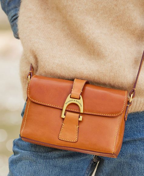 All You Need To Know About Florentine Leather Care Dooney And Bourke Crossbody Bag, Dooney Bourke Crossbody Bag, Small Leather Crossbody Purse, Dooney Bourke Handbags Outfits, Dooney And Bourke Handbags, Feed Bag, Duck Bag, Tan Cowhide, Shop Sale