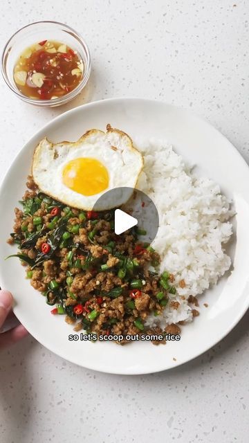 Pepper.ph on Instagram: "🍃 Pad Kra Pao. The star of this Thai dish isn’t the giniling, but the holy basil—pad kra pao means “stir-fried holy basil”. It adds a peppery aroma to the spicy, garlicky ground pork. Or chicken. Or beef!  The green beans are optional, but we like the additional nutrition + crunch. The crispy egg, like the basil, is non-negotiable. Don’t skip it!  * 3 Thai or local red chilies * 4 garlic cloves * 2 ½ T oyster sauce * 1 T fish sauce * ½ T light soy sauce * 1 t sugar * 300–350g ground pork * 1 c green beans * 1 c holy or Thai basil * 2 eggs  Full recipe on pepper.ph, link in bio." Thai Basil, Holy Basil, Thai Dishes, Red Chili, Oyster Sauce, Ground Chicken, Fish Sauce, Ground Pork, Thai Recipes