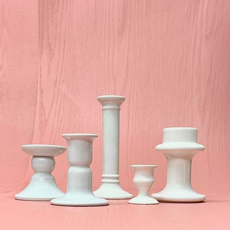 Assorted white candle holders, group of 5. This beautiful set of ceramic candle holders comes in an assortment of shapes and sizes. Shortest: 2.5"H Tallest: 7.75"H Stoneware Candle Holder, White Ceramic Candle Holders, Candlestick Holder Ceramic, White Company Candle Holder, White Candle Holders, Porcelain Candle Holder, Ceramic Candle Holders, Ceramic Candle, White Candles