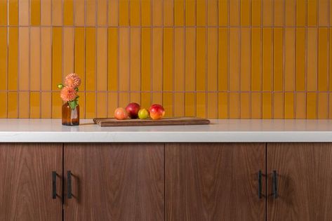 Dashing and a bit retro, a slim grid of mustard tile offers memories of the ’70s without feeling dated. | Source: Fireclay Tile Vertical Tile, Barn Wood Bathroom, Matte Tiles, Rustic Toilets, Orange Tiles, Rustic Bathroom Vanities, Fireclay Tile, Orange Kitchen, Tile Trends