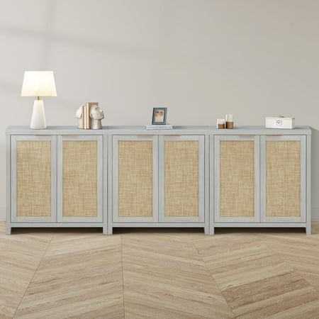 Enhance your homes style and functionality with this elegant cabinet, featuring a natural oak veneer and rattan doors. Perfect as a dining room sideboard buffet cabinet, modern credenza, kitchen console, entryway or hallway storage, or a chic accent cabinet in the living room, this versatile piece seamlessly complements any decor. Hightlight: Mist Oak veneer and stylish rattan doors matches various decor Thickened boards(1.4") make it more sturdy and durable. Two adjustable shelves provide ample storage space for various needs. Combine multiple cabinets seamlessly to create a customized storage solution Specifications: Color: Mist Oak Finish Material: MDF, Rattan Product Size: 31.4 W x 13.7D x 32.7 H Package Contents: 3 x Modern Storage Cabinet 3 x Accessory Kit 3 x Instruction Manual Colo Buffet Cabinet Decor, Credenza Kitchen, Coastal Sideboard, Buffet Cabinet Modern, Kitchen Console, Rattan Storage Cabinet, Living Room Credenza, Storage Cabinet Living Room, Rattan Doors