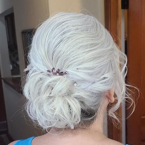 Lacy Low Updo for White Hair Gray Hair Updos Over 50, Grey Hair Updo Older Women, Silver Hair Updo, Hairstyles For White Hair, Grey Hair Updos, Hair Dos For Wedding, Graying Gracefully, Messy Updos, Book Styling