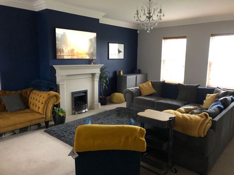 Blue And Mustard Living Room, Mustard Living Room, Dark Blue Feature Wall, Mustard Living Rooms, Blue Feature Wall, Blue Sofas Living Room, Blue Walls Living Room, Blue Sofas, Grey Lounge