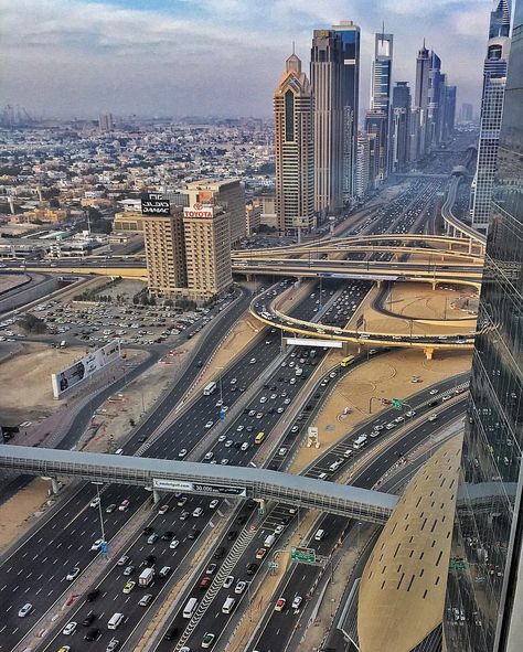 https://flic.kr/p/DTAHTx | Sheikh Zayed Road - Dubai | In Dubai, E 11 is known as "Sheikh Zayed Road". This road is the main artery of the city. The highway runs parallel to the coastline from Trade Centre Roundabout to the border with the emirate of Abu Dhabi, 55 kilometres (34 mi) away in the area of Jebel Ali. The road was formerly known as Defence Road. Between 1993 and 1998, 30 kilometres (19 mi) of the road was expanded. Along with this improvement came a change in the name. Shei Sheikh Zayed Road, Dubai Skyscraper, Sheikh Zayed, Palm Jumeirah, Trade Centre, Jeddah, Sharjah, Arab Emirates, United Arab Emirates