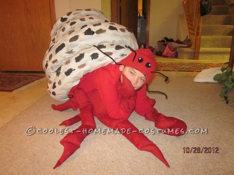 I used a laundry basket as the base for the shell.  Started with an old sheet cut into 8" wide strips and sewn into long tubes. Stuffed them with paper and Hermit Crab Costume, Crab Halloween Costume, Rainbow Fish Costume, Shell Costume, Crab Costume, Fish Costume, Homemade Costume, Halloween Costume Idea, Red Stockings