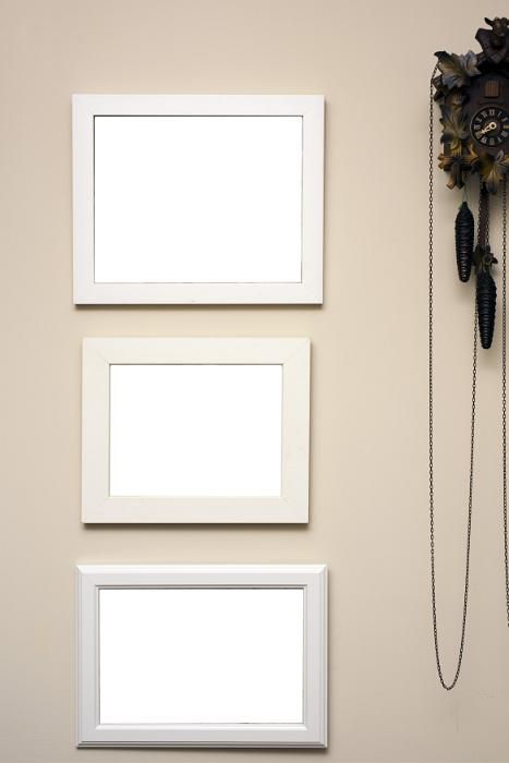 Three empty frames hanging on a beige colored wall alongside a wooden carved cuckoo clock with pendulums - free stock photo from www.freeimages.co.uk Silk Rose Petals, Blank Photo, Empty Frames, Silk Rose, Frame Wall, Cuckoo Clock, Wall Colors, Rose Petals, Free Image