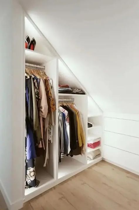 a minimalist closet Slanted Wardrobe Ideas, Angled Wardrobe Ideas, Attic Walk In Wardrobe, Slanted Walk In Closet, Attic Closet Ideas Angled Ceilings Diy, Attic Into Closet, Under Eaves Closet Ideas, Low Sloped Ceiling Closet, Closet Ideas For Slanted Ceilings