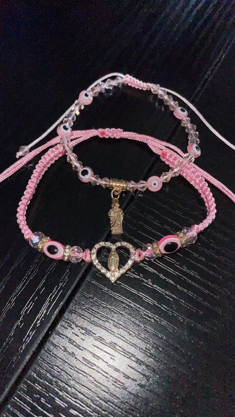 Two pink bracelets of the Virgen Mary and the other one with St. Jude. Latina Bracelets, Mexican Bracelets, Pink Bracelets, Bracelet Business, Girly Bracelets, Braided Bracelet Diy, Belly Piercing Jewelry, Christian Bracelets, Bracelets Ideas