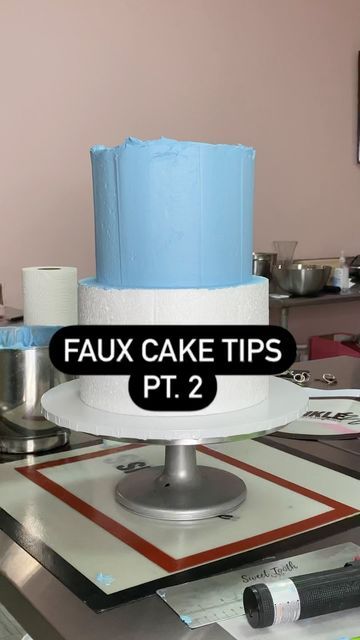 The Cake Dealer on Instagram: "Let’s talk icing a faux cake… So I’ve seen some people use the patch and paint from your local hardware store and I’ve seen some people make their own buttercream to cover their faux cakes… but what I like to do is use Sam’s buttercream In my opinion Sam’s buttercream is working smarter and not harder you get a large amount for an expensive price… you cut the labor of making icing…you can color it to whatever color you may need …you can use one bucket on multiple Faux Cakes For Display, Making Icing, Faux Cake, Dummy Cake, How To Make Icing, Tall Cakes, Fake Cake, Fake Bake, Cake Display