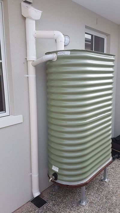 Colorbond slimline tank on a stand connected for garden watering. Install a rainwater tank near the house and have a tap on it for watering your garden. Building A New House, Rainwater Tank, Jumma Mubarak Beautiful Images, Rain Water Tank, Rain Collection, Garden Watering, Rain Barrel, Building A New Home, Water Storage