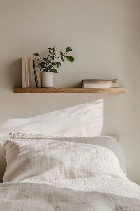 Wall-mounted floating shelf serving as a nightstand next to a bed in a small room. Creative Nightstand Ideas, Creative Nightstand, Nightstand Aesthetic, Nightstand Ideas, Ideas For Small Spaces, Bedroom Storage, Small Bedroom, Floating Nightstand, Wall Shelves