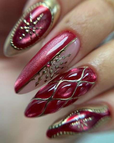 gold snowflakes and red velvet Handpainted using @stellar_gel HF hard structure gel pink cashmere Cathedral ruby mixed with silver bells cat-eye @amazon chrome @sissiofficial_ Easy-squeezy Ring finger and thumb inspired by @heygreatnails ✨ #nails #nailsofinstagram #nailsonfleek #nails💅 #nails2inspire #nailswag #nailstyle #nailsnailsnails #showyourclawssss #nailart #naildesigns #nailsoftheday #naildesign #nailthegram #nailinspo #thenailconnectionxo #nailsmagazine #nailitmag #scratch... Ruby Nails, Gold Snowflake, Silver Bells, Christmas Nail Designs, Christmas Nail, Nails Magazine, Nails On Fleek, Ring Finger, Swag Nails