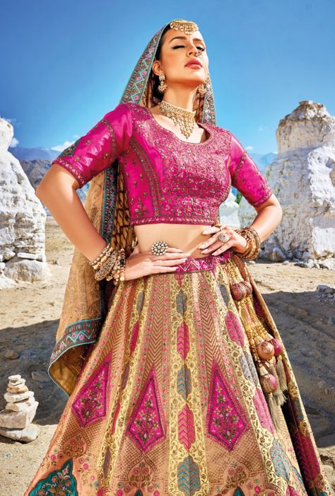 Crafted with the finest Banarasi Silk, luxurious jacquard and elegant satin, this lehenga is the ultimate embodiment of opulence and grace. LEHENGA FABRIC: Banaras Silk Jacquard BLOUSE FABRIC: Satin DUPATTA: Pure Georgette Viscose SIZING: Can be stitched upto 42 inches bust and waist SHIPPING: The product will be shipped within 1 - 2 weeks from the date of purchase. Stitched item will ship within 2-3 weeks from the date of the order All stitched products are final sale. We will contact you withi Banarsi Silk Lehenga, Jacquard Lehenga, Wedding Lehenga Choli, Lehenga Fabric, Lehenga Online, Perfect Bride, Choli Designs, Anarkali Kurta, Hand Work Embroidery