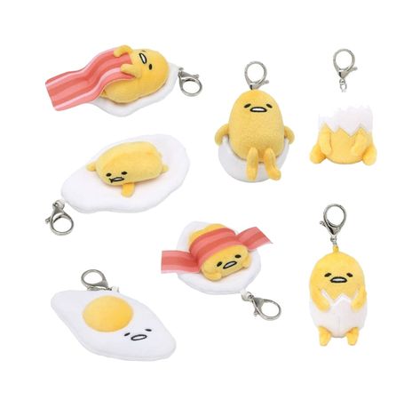 From Sanrio, the makers of Hello Kitty, GUND is proud to present Gudetama, a lazy egg and popular Japanese YouTube cartoon who isn't a big fan of doing anything at All. Now fans of Gudetama can peek inside its shell for a surprise with the Gudetama blind box Series #1! This series features the lazy egg as eight different styles of plush with an included lobster clasp keychain inside plastic eggs, such as: Gudetama with bacon blanket, sitting Gudetama, egg on head, bacon-wrapped, sunny side up, s Gudetama Plush, Gudetama Egg, The Lazy Egg, Dino Costume, Lazy Egg, Plush Keychain, Mystery Minis, Japanese Cartoon, Plush Toy Dolls