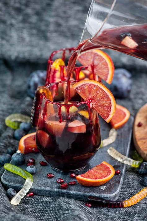 Try this spooky and fun twist on the classic red wine Sangria for your Halloween party. This Halloween Sangria (or Hallowine Sangria?!) is a delicious and fruity cocktail made with red wine, brandy, and orange juice! Halloween Sangria, Puff Pastry Recipes Savory, Brown Sugar Simple Syrup, Mushroom Tart, Red Wine Sangria, Make Brown Sugar, Fruity Cocktail, Wine Sangria, Make Simple Syrup