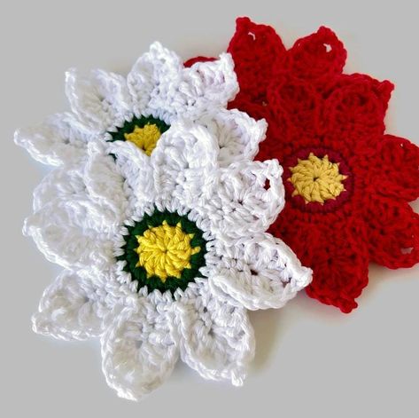 Made to Order in 7 - 10 business days Colorful holiday coasters in Poinsettia flower shapes.  Each coaster is crocheted with 100% cotton yarns in white or red with coordinating centers The coasters measures approx approx 6" (14.5 cm) across.  Would also be great to use as mats under votive or tea-light candles. Made in a smoke and pet free environment.  Machine washable and lay flat to dryer, or machine dry on low heat.  Handmade by me from my own original pattern. Item colors may vary slightly from listing photos due to differences in device displays and yarn manufacturer dye lots. Crochet Poinsettia Coaster, Winter Dining Table Decor, Winter Dining Table, Poinsettia Crochet, Crochet Poinsettia, Snowflake Coaster, Kitchen Decor Christmas, Crochet Kingdom, Poinsettia Decor