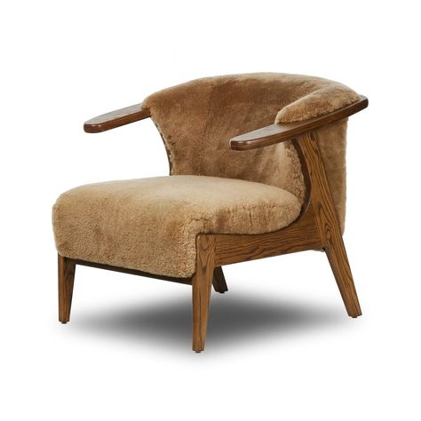 Dimensions: 30.75"w x 33.00"d x 28.25"h Arm height: 28 in Seat height: 17.3 in Seat depth: 23 in Seat width: 22 in Materials: 100% Sheared Sheepskin, Solid Ash Color: Desert Shearling, Amber Ash Wood Weight: 39 lbs Subtle paddle arms and a wrap frame of amber-finished ash embrace soft brown shearling, while S-spring construction ensures exceptional comfort. Shearling Chair, Study Furniture, Bedroom Sideboard, Dude Ranch, San Clemente, Kitchen Mirror, Barrel Chair, Four Hands, Soft Brown