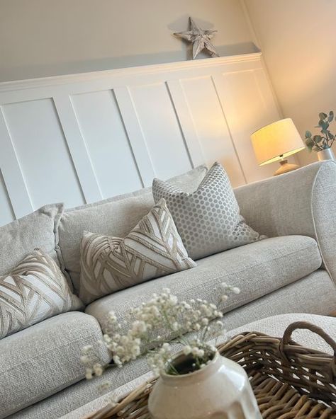 Living Room Feature Wall Panelling, Ideas For Bare Wall In Living Room, Living Room Panelling With Shelf, Modern Living Room Panelling Ideas, High Panelling Living Room, Paneling Behind Sofa, Neutral Living Room Panelling, Beige Panelling Living Room, Panelling Behind Sofa