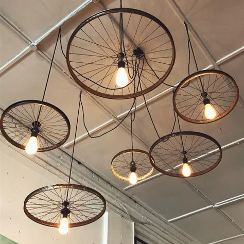 Coastal store #DIY Bicycle Cafe Design Bike Shops, Bike Shop Interior, Bicycle Wheel Decor, Bicycle Parts Art, Hang From Ceiling Decor, Bicycle Decoration, Bike Shop Ideas, Arabic Interior Design, Bicycle Cafe