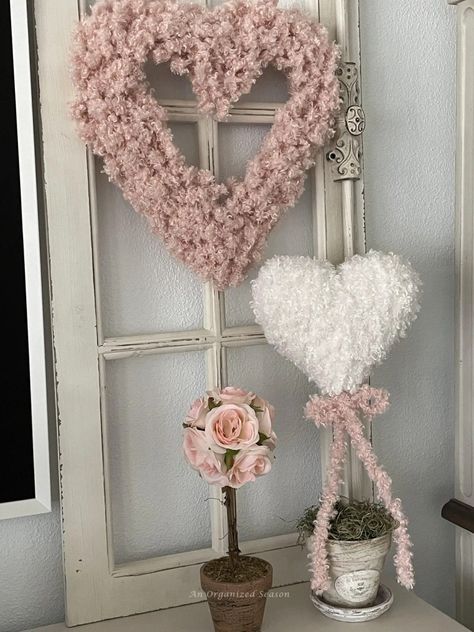 Do you love topiaries? I'm going to show you how to take a Dollar Tree styrofoam heart and turn it into a beautiful DIY topiary to decorate for Valentine's Day! Learn how to make a topiary using Teddy Bear yarn and a styrofoam heart. This is a simple DIY project so grab your glue gun and let's get started! Please pin this and follow us for more DIY and seasonal decor inspiration! Neutral Valentines Decor, Kids Birthday Ideas, Diy Topiary, Flower Oasis, Friendsgiving Ideas, Topiary Diy, Valentine Wreath Diy, Fun Valentines Day Ideas, Tree Heart