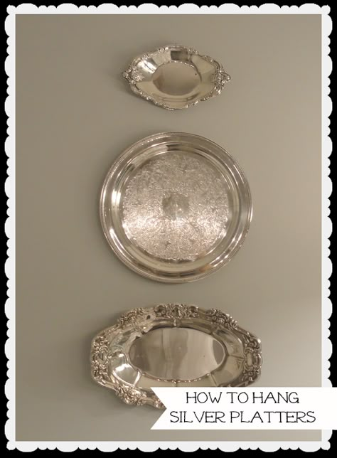 A quick and easy way to hang lightweight silver platters on the wall, without using a wire plate hanger.  3M Command Hooks and a twist tie provide an invisible hook to hang these on the wall.  How to's at 11 Magnolia Lane.  Too easy! Silver Plates, Silver Display, Silver Platters, Plate Hangers, Silver Trays, Silver Decor, How To Hang, Silver Pieces, Household Hacks