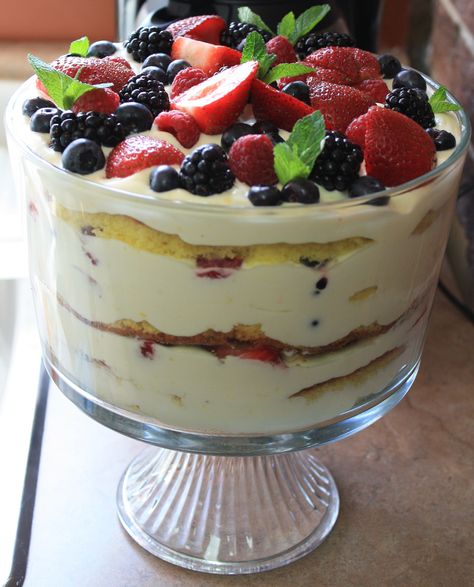 lemon curd trifle with fresh berries: Subbed angel food cake. Made fresh whipped cream with lemon curd blended into cream...layers with fresh berries. Lovely, light and not too sweet. 180 calories for a  1 cup serving. Lemon Curd Trifle, Pound Cake Trifle, Trifle Bowl Recipes, Cake Trifle, Trifle Dessert Recipes, Trifle Pudding, Trifle Desserts, Layered Desserts, Trifle Recipe