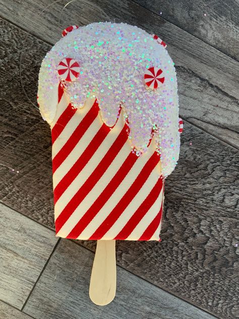 Ice cream, Peppermint Ice Cream Bar, Ice Cream Bar Ornament, Sweets, Treats, Fake Bake, 6" S W E E T  . . . This peppermint ice cream bar is the cutest!  Toped with glitter, it will add an element of fun & whimsy to your design.   Shipping: In 1 business day, your purchase will be correctly packed and shipped via UPS ground.  Tracking information will be provided at time of shipping.   If you require alternative shipping needs, please message me.  I'm happy to try and accommodate.   If you live in the Carrizo Springs, Texas area, come see us at 1302 West Pena Street.  If you are in the San Antonio, Texas area, I will refund the shipping charge and arrange delivery of your purchase. Peppermint Forest Decorations, Gingerbread Decorations Diy, Candy Themed Christmas Decor, Giant Popsicle, Christmas Candy Decor, Ice Cream Christmas, Christmas Decor Diy Cheap, Christmas Ice Cream, Candy Decorations Diy