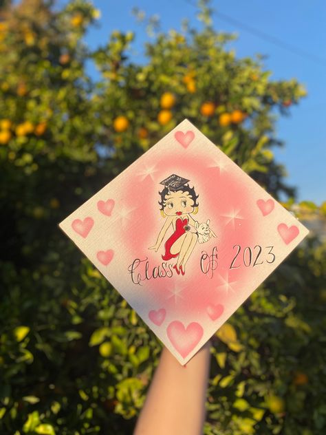 Airbrush Graduation Cap, Betty Boop Graduation Cap, Graduation Cap Designs Painted, Lana Graduation Cap, Dolly Graduation Cap, Chicano Graduation Cap, Graduation Cap Designs Coquette, Painted Graduation Cap, Graduation Cap Flowers Painted