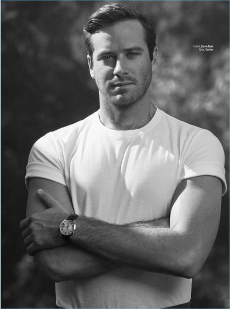 Embracing casual style, Armie Hammer wears a Calvin Klein t-shirt and Cartier watch. Arnie Hammer, Armie Hammer, Call Me By Your Name, The Man From Uncle, Name Photo, Man Crush, Mens Fashion Trends, Male Beauty, Celebrities Male