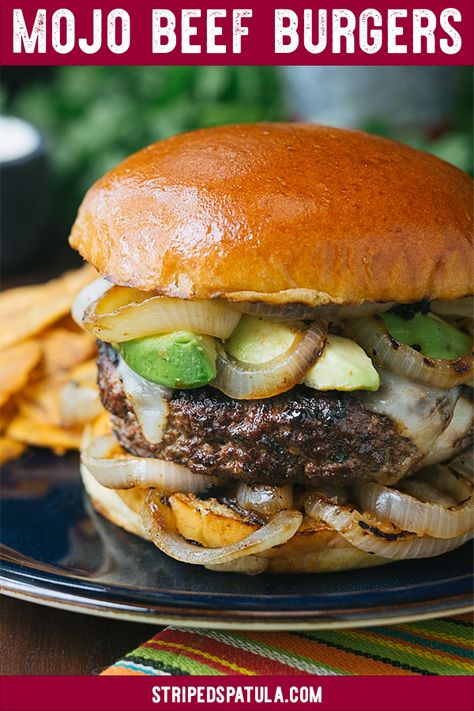 This gourmet burger recipe combines the bright, citrusy flavors of Cuban mojo sauce with a juicy all beef patty, grilled onions, and Manchego cheese. Topped with an easy to make Tequila Lime Aioli, these craft burgers are perfect for a festive summer cookout menu!  .. #stripedspatula #grilling #burger #hamburger #4thofjuly #picnic #beef #summerrecipes #recipeideas #recipe #recipeoftheday Mojo Beef, Cuban Mojo Sauce, Gourmet Burgers Recipes, Mojo Sauce, Cookout Menu, Cuban Mojo, Lime Aioli, Gourmet Burger, Summer Cookout