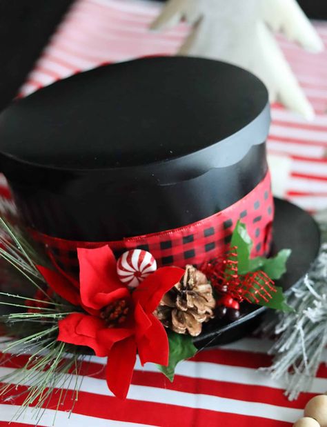 Dollar Tree Snowman Hat Diy, Christmas Buckets Diy, Snowman Top Hat Diy, Diy Snowman Top Hat, Snowmen Hats How To Make, Diy Dollar Tree Snowman Crafts, Snowman Christmas Decor Ideas, Snowman Hat Centerpiece Diy, Christmas Top Hats Diy