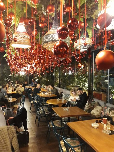 Christmas decoration coffe bar restaurant by stinteriordesign.gr Christmas Decorations Bar Restaurant, Christmas Decoration For Restaurant, Christmas Decor Ideas Cafe, Christmas Decor Ideas For Restaurant Bar, Christmas Decor Ideas For Cafe, Pub Christmas Decor, Christmas Decor Restaurant Ideas, Christmas Pub Decorations, Pub Christmas Decorations