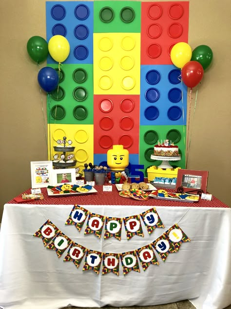 Cake table for a LEGO / Building Block Birthday Party Building Blocks Birthday Party, Building Block Birthday Party, Lego Birthday Table Decor, Lego Birthday Party Balloons, Lego Party Backdrop, Easy Lego Party Decorations, Lego Party Cake Table, Lego Birthday Backdrop Ideas, Lego Backdrop