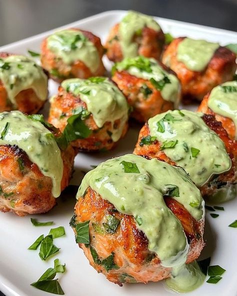 Recipes Cookery | Baked Salmon Meatballs with Creamy Avocado Sauce 🐟🍽️🥑 | Facebook Baked Salmon Meatballs With Avocado Sauce, Salmon Meatballs With Avocado Crema, Baked Salmon Meatballs, Baked Salmon Meatballs With Creamy Avocado Sauce, Salmon Balls Recipes, Salmon Meatballs Recipes, Salmon Balls, Avocado Sauce Recipe, Salmon Meatballs