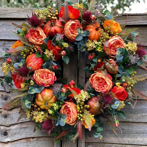 PRICES MAY VARY. 【Fall Peony And Pumpkin Wreath】This lovely farmhouse-style pumpkin door hanger will look lovely gracing your front door this fall! Use this faux peony pumpkin wreath to say "Welcome to our home" throughout the season. Enjoy this beautiful, deluxe wreath for years to come! Welcome your guests with this stunning autumn pumpkin wreath. 【Excellent Material】high quality material, durable and reusable. Looks very beautiful on double doors and/or French doors, which makes autumn more c Farmhouse Fall Wreath, Pumpkin Garland, Feuille Eucalyptus, Thanksgiving Wreath, Harvest Wreath, Pumpkin Flower, Door Wreaths Fall, Porte Decorate, Peonies Wreath