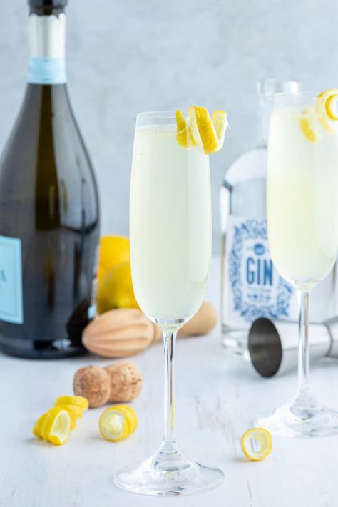 French 75 Cocktail recipe from RecipeGirl.com Lemon Garnish, French 75 Cocktail Recipes, Yeast Bread Rolls, Cocktails Made With Gin, Cranberry Mimosa, French 75 Cocktail, Cocktail Pitcher, Gin Lemon, Brunch Casserole