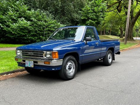 This 1987 Toyota Pickup Deluxe is a 2WD model that has just over 61K miles and is said to be in excellent, rust-free condition. #Toyota Toyota Pick Up, 1987 Toyota Pickup, Old Toyota, Toyota Pickup 4x4, School Decal, Small Garage, Character Pictures, Toyota Pickup, Cartoon Character Pictures