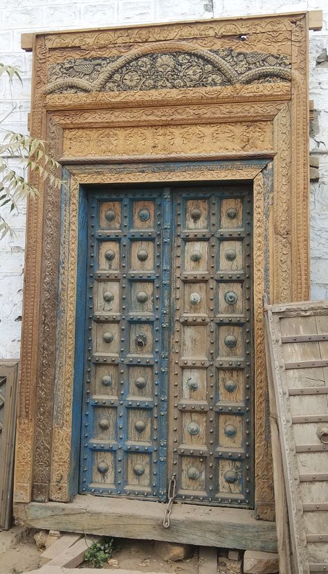 We are dealer of antique, vintage, traditional, rustic, old royal looking Indian Rajasthani haveli doors. This collection of this video reflects Indian tradition, Indian history, Indian culture, Rajasthani tradition, and Rajasthani culture.   #doors #door #architecture #windows #doorsofinstagram #doorsandwindows #design #travel #interiordesign #indieartist #wood #home #travelphotography #olddoors #rajasthanidoors #antiquedoors #vintage #indian #traditional #carving #doorsoflondon #doorsworldiwde Royal Doors Design, Old Haveli Doors, Rajasthani Door Design, Antique Indian Doors, Traditional Door Design Indian, Antique Door Ideas, Traditional Doors Indian, Indian Door Design, Rajasthani Haveli