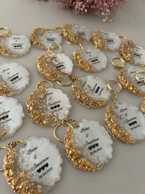 [Ad] Wedding Keychain Favors | Bridal Shower Keychain Favors | Elegant Wedding Favors | Unique Wedding Gifts | Bridesmaid Gift Ideas | Party Shower Favors Very Elegant Gold Wedding Keychains Are The Cutest Favor Idea On Your Special Day! These Are So Adorable, Good Quality Magnet And Sticker. I Am Pretty Sure That Your Guests Are Going To Ask Where Did You Get This From! For This Listing Minimum Quantity Order Is 79 Pieces. I Ship With Ups, Tnt And #rusticweddingfavorsforguests Wedding Keychain Favors, Keychain Favors, Wedding Favors Unique, Wedding Keychain, Wedding Favours Magnets, Bridesmaid Gift Ideas, Resin Crafts Tutorial, Elegant Wedding Favors, Rustic Wedding Favors