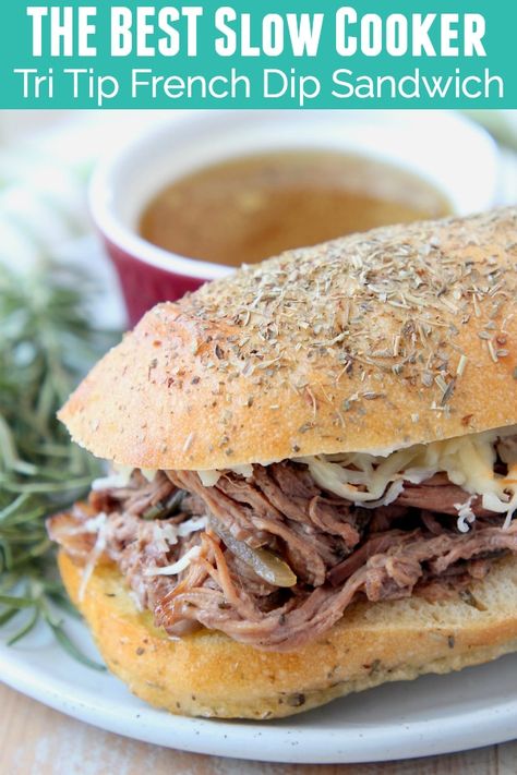 Rosemary Garlic Tri Tip is slow cooked in a crock pot. It's then shredded and served on Rosemary Focaccia Bread with au jus to create this scrumptious French Dip sandwich recipe! It only takes about 20 minutes of hands-on time to prepare this easy tri tip recipe. The crock pot will do the rest of the work for you! Tri Tip Recipes Crockpot, Slow Cooker Tri Tip, French Dip Sandwich Recipe, Tritip Recipes, Tri Tip Steak Recipes, Rosemary Focaccia Bread, French Dip Recipes, French Dip Crock Pot, French Dip Sandwiches