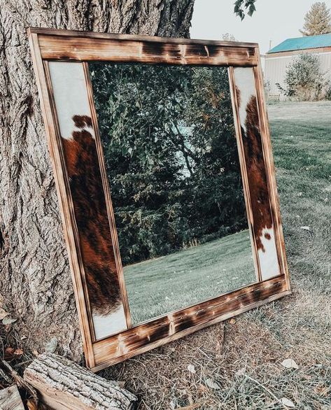 Western Style Mirrors, Cow Hide Mirror Frame, Burnt Card Mirror Western, Cowhide Mirror Frame, Diy Cowhide Mirror, Cowhide Mirror Frame Diy, Big Mirror Aesthetic, Cow Hide Mirror, Cowhide Bedroom Ideas