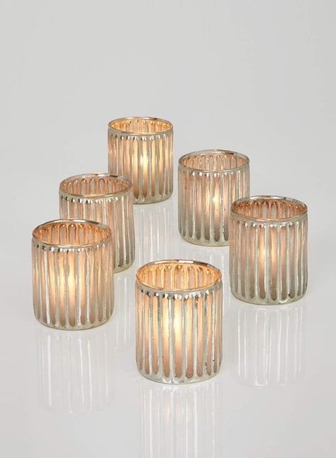 SILVER VOTIVE CANDLES HOLDERS - These antique glass candleholders have the look and pattern of corrugated cardboard with raised shiny silver frosted glass VERSATILE CANDLE HOLDERS- You could use them for a vintage style table setting, but you'll be surprised how beautiful they look on a modern tablescape as well! Modern Tablescape, Mercury Glass Candle Holders, Bulk Candles, Wholesale Candles, Glass Votive Holders, Winter Wedding Decorations, Candle Glow, Votive Holder, Glass Votive