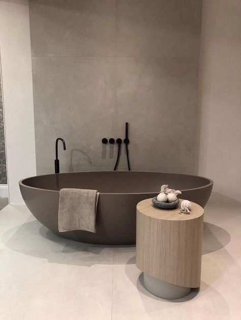 minimalist modern bathroom, wood side table , brown stone bathtub, Stone Bathtub, Stone Bathroom, Stone Bath, Small Bathroom Ideas On A Budget, Bathroom Remodel With Tub, Bathroom Design Luxury, Bad Design, Bathroom Collections, Rustic Bathroom