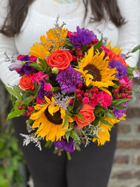 Purple Orange Yellow Wedding Flowers, Red Purple Yellow Bouquet, Purple Yellow Red Wedding, Red Yellow Purple Flower Arrangements, Pink Orange Purple Bridesmaids, Sunflower Pink Bouquet, Purple Arrangements, Iris Wedding Bouquet, Red Sunflower Wedding