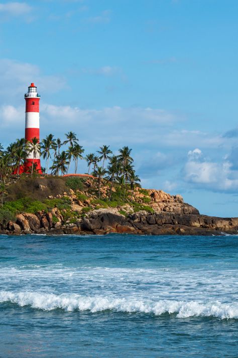 At Kovalam Beach, visitors are treated to stunning golden sands, gentle waves, and the iconic Lighthouse Beach, where they can climb the lighthouse for panoramic views. Hawa Beach offers a lively atmosphere with local fishermen at work, while Samudra Beach provides a peaceful, quiet retreat. The sunset here is a must-see, with the sky turning vibrant hues of pink and orange. Visitors can also explore local markets, indulge in Ayurvedic treatments, and enjoy water sports like surfing and parasail Kovalam Beach Kerala, Kerala Beach, Kovalam Beach, Kovalam, Best Of Both Worlds, Beach Holiday, Range Rover, Kerala, Relaxation