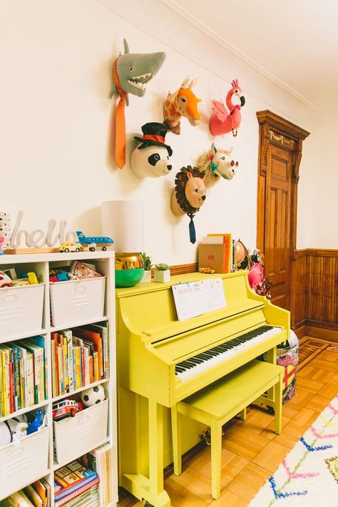 the kids playroom reveal! Piano In Playroom, Fun Colorful Playroom, Playroom With Piano, 70s Playroom, Storybook Playroom, Maximalist Playroom, Music Playroom, Eclectic Playroom, Yellow Piano