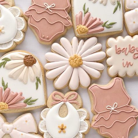 Emilee Galica - Wildflour Cookie Co. on Instagram: "baby in bloom 🌸 . . . #sugarcookies #decoratedcookies #sugarcookiesofinstagram #royalicingart #cookiedecorator #cookiedecorating #michiganmade #michiganbaker #puremichigan #cookiesofinstagram #royalicingcookies #royalicing #customcookies #cookieart #talentedcookiers #icedcookies #partyplanning #michiganfood #cookiegram #lansingmichigan #lansingmi #grandledge #grandrapids #cookieoftheday #babyinbloom #babyshowercookies #babygirlcookies" Peony Cookies, Girl Baby Shower Cookies, Baby In Bloom Cookies Girl, Floral Baby Shower Cookies, Baby Shower Cookies For Girl, Baby In Bloom Cookies, Wildflower Cookies Baby, Baby In Bloom Sugar Cookies, Floral First Birthday Cookies