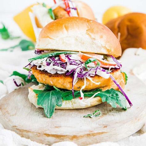 Fire up your griddles because these delicious salmon burgers are loaded up with a homemade jicama coleslaw & a dill dressing on toasted buns! Epic Sandwiches, Salmon Burgers Recipe, Homemade Salmon Patties, Grilled Salmon Burgers, Jicama Recipe, Salmon Burger Recipe, Veggie Board, Salmon Burger, Billy Parisi