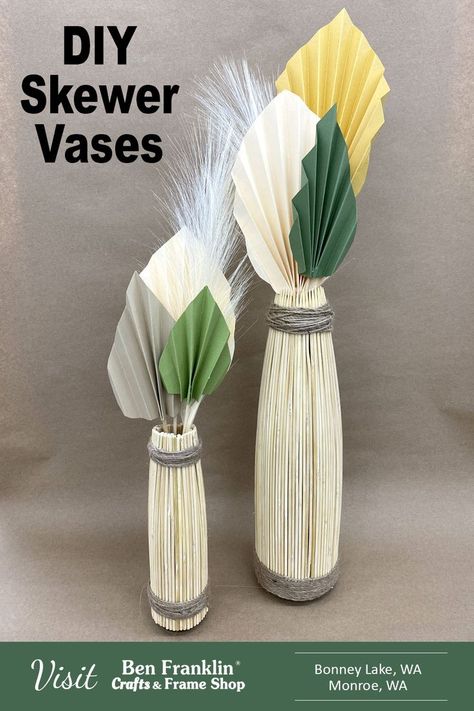 Recycle glass bottles by adding bamboo skewers to create this vase that has a natural boho look! We included a video to help you understand how we made this decorative bottle and how we created the leaves using cardstock paper, a score board and glue! #BenFranklin #BohoTrend #DIY #craft Vase With Sticks, Diy Vase Ideas Recycling Bottle Crafts, Bamboo Skewers Diy, Bamboo Skewer Crafts, Wood Beads Vase, Wood Bead Vase Diy, Skewer Crafts, Recycle Crafts Diy, Recycled Glass Bottles